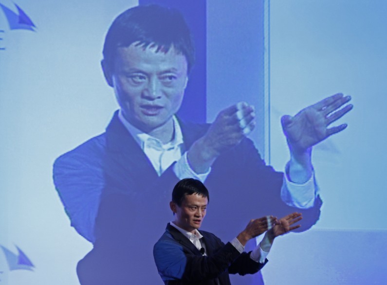 Jack Ma, Chairman of China's largest e-commerce firm Alibaba Group, gestures during a conference in Hong Kong   Wednesday, March 20, 2012. Ma expects 30 percent of China's total retail sales to be conducted online in five years' time. (AP Photo/Vincent Yu)