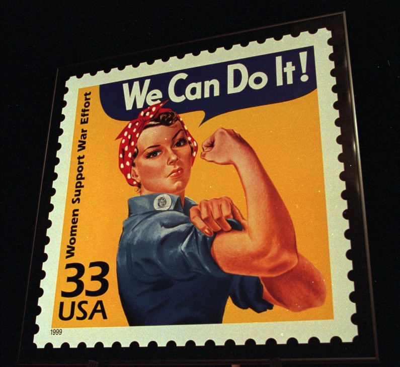 FILE - A June 25, 1999, file photo shows an enlargement of the U.S. Postal Service's stamp depicting Rosie the Riveter, in South Portland, Maine. A group wants to preserve a portion of the old Willow Run bomber plant and house a museum there dedicated to aviation and the countless Rosies across the country. Save the Bomber Plant officials have until Thursday, May 1, to raise the remainder of the $8 million needed to save the plant from demolition. (AP Photo/Joan Seidel, File)
