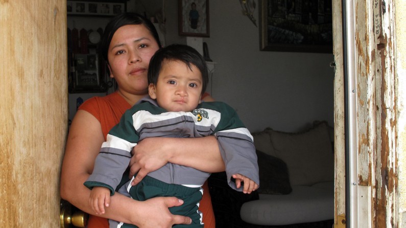 Daria Hernandez holds her twenty-month-old son, Ivan at her home Wednesday February, 3, 2010 in Kettleman City, Calif.  Ivan has suffered through two surgeries to repair a cleft palate and his mother believes it is a birth defect because they live three miles downwind from the biggest hazardous waste landfill west of the Mississippi.  (AP Photo/Tracie Cone)