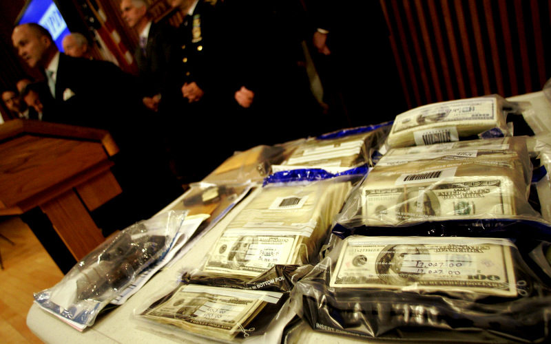 Confiscated cash on display as New York Police Commissioner Raymond Kelly speaks to reporters during a news conference at New York City Police Department. (AP/Mary Altaffer)
