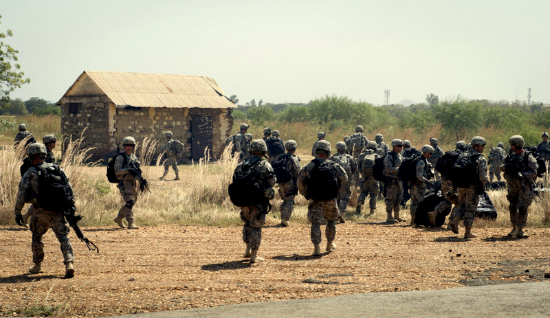 Soldiers of the East Africa Response Force (EARF), a Djibouti-based joint team assigned to Combined Joint Task Force-Horn of Africa, depart from a U.S. Air Force C-130 Hercules in Juba, South Sudan. 