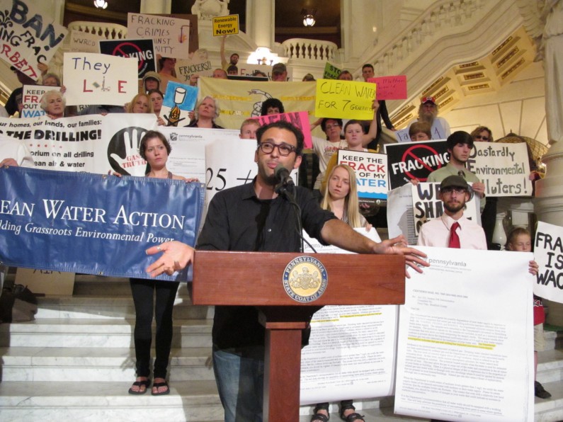 Josh Fox, director of the anti-fracking documentary "Gasland," appears at a rally in the Pennsylvania Capitol by anti-gas drilling activists to press Gov. Tom Corbett and state environmental regulators for more information about the extent of water contamination caused by the activity on Tuesday, June 18, 2013 in Harrisburg, Pa. (AP Photo/Marc Levy)