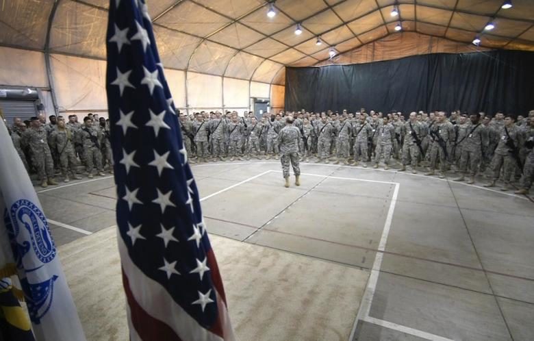 US Chairman of the Joint Chiefs of Staff, Army General Martin E. Dempsey as he addresses questions from US military members during a town hall meeting in Baghdad, Iraq, November 15, 2014.