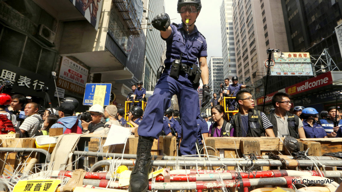 Hong Kong Riot Police Clear Protest Site, Arrest Student Leaders