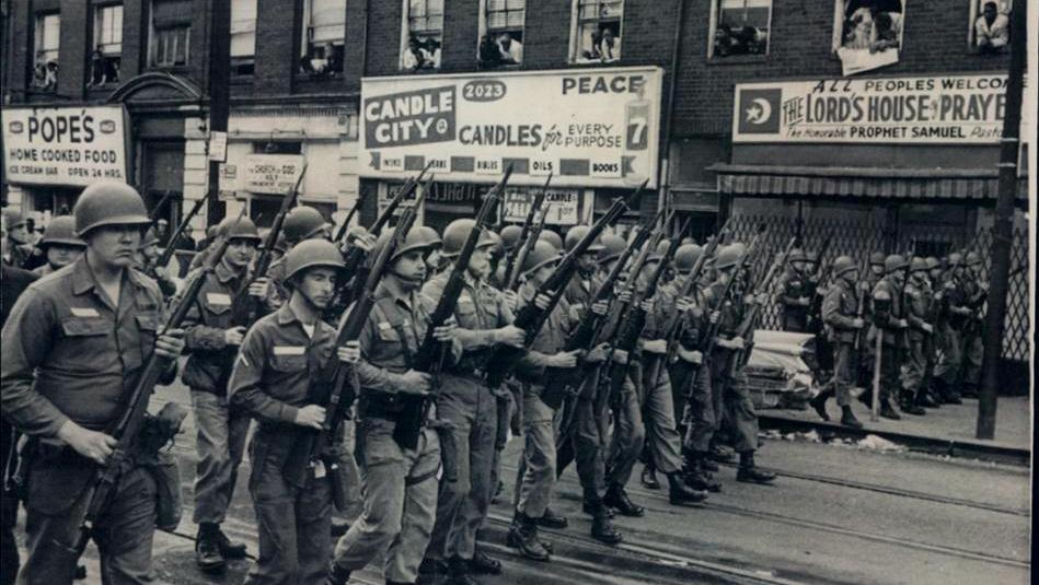 National Guard clear streets in Pittsburgh during race riot, 1968.