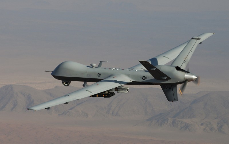 In this undated handout file photo provided by the U.S. Air Force, a MQ-9 Reaper, armed with GBU-12 Paveway II laser guided munitions and AGM-114 Hellfire missiles, is piloted by Col. Lex Turner during a combat mission over southern Afghanistan. The Air Force is taking several steps to fill a significant shortfall in drone pilots, laying out plans to increase incentive pay, bring more National Guard and Reserve pilots onto active duty, and seek volunteers to fill needed slots, Air Force Secretary Deborah Lee James said Thursday. (AP Photo/Lt. Col.. Leslie Pratt, US Air Force, File)