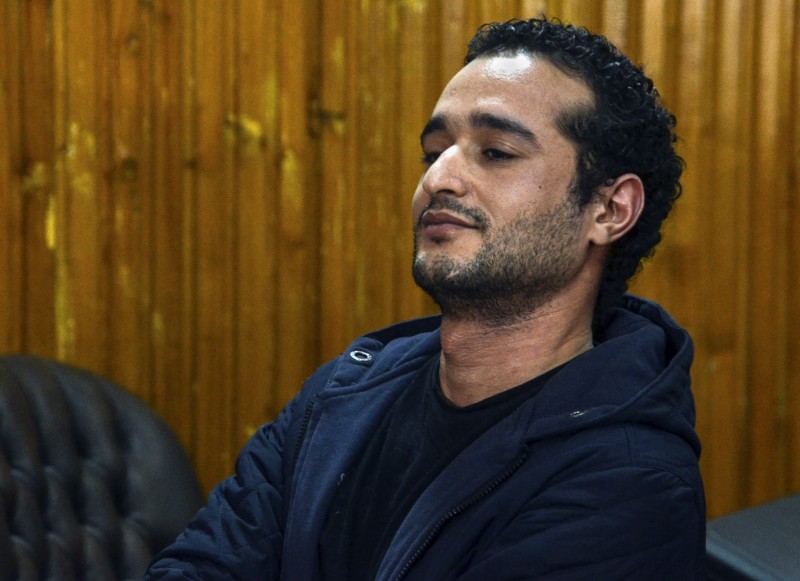Ahmed Douma, one of the leading activists behind Egypts 2011 uprising, attends a court hearing in a case against 230 people including Douma, for taking part in clashes between protesters and security forces, in a courtroom of Torah prison, Cairo, Egypt, Wednesday, Feb. 4, 2015. Judge Mohammed Nagi Shehata found them guilty and sentenced them, including Douma, to life in prison. Last year, Egypts powerful lawyers union criticized Shehata for "disparaging" and "terrorizing" Douma's defense team after he referred five of the team's six lawyers to prosecutors for investigation.  The union instructed all members to boycott Shehata's court. (AP Photo/Mohammed El-Raaei)