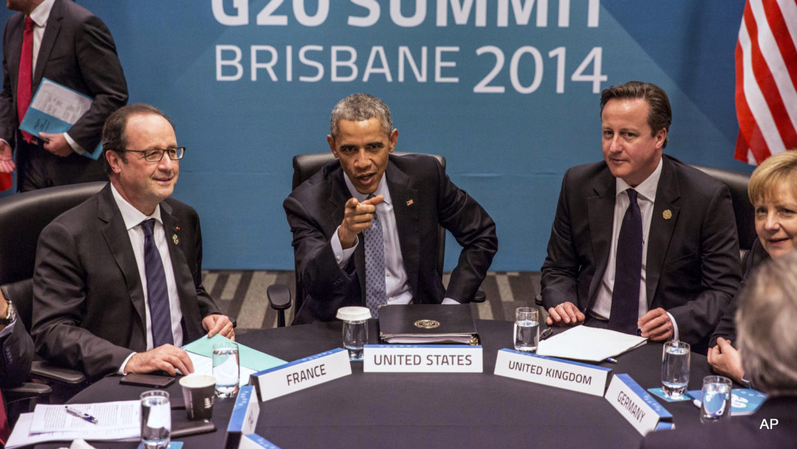 President of France Francois Hollande, U.S. President Barack Obama, Britain's Prime Minister David Cameron and Germany's Chancellor Angela Merkel attend the Transatlantic Trade and Investment Partnership (TTIP) meeting at the G20 the G-20 leaders summit in Brisbane, Australia