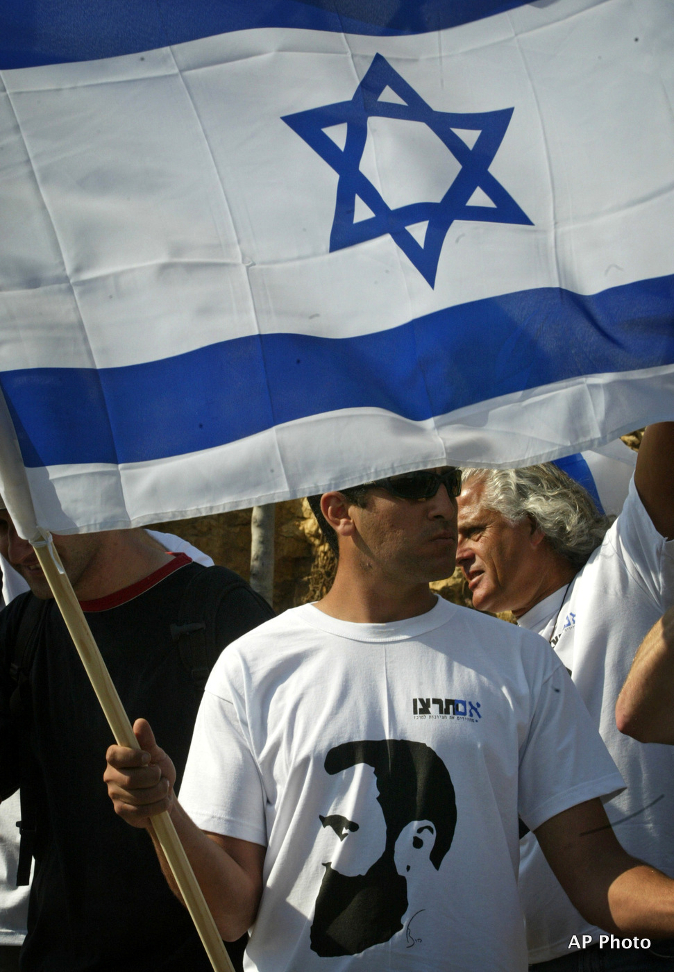An Israeli, wearing a shirt with an image of Theodor Herzl, the founder of modern Zionism