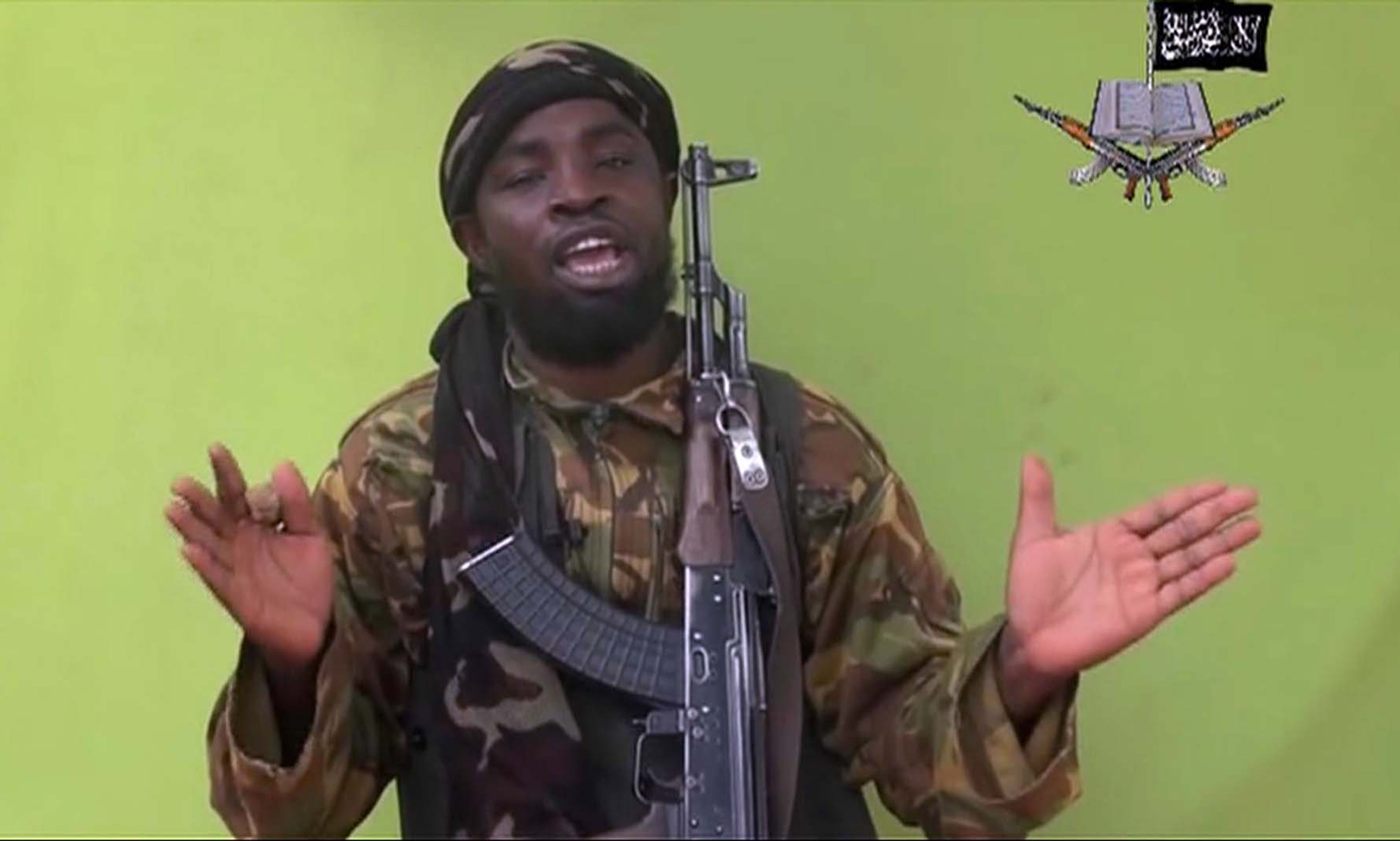 Nigeria's Boko Haram leader Abubakar Shekau speaking to the camera. Shekau has allegedly made a formal allegiance to ISIS on, March 7, 2015, in an audio message posted on Twitter. (AP Photo)