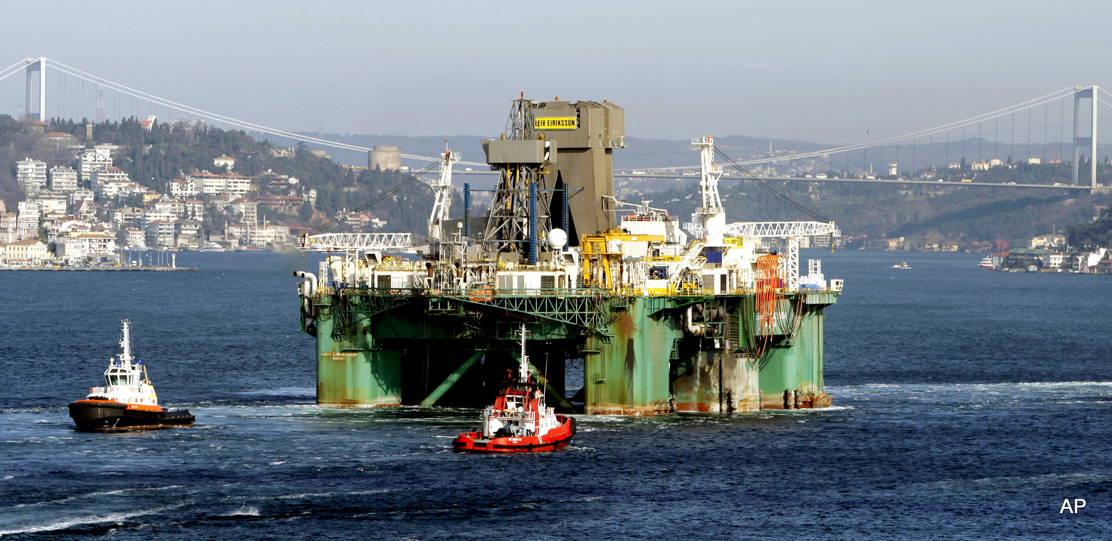 The Leiv Eiriksson, one of the world's largest rigs, makes its way crossing the Istanbul's narrow Bosporus Strait to the Black Sea, in Istanbul, Turkey, Thursday, Dec. 31, 2009. 