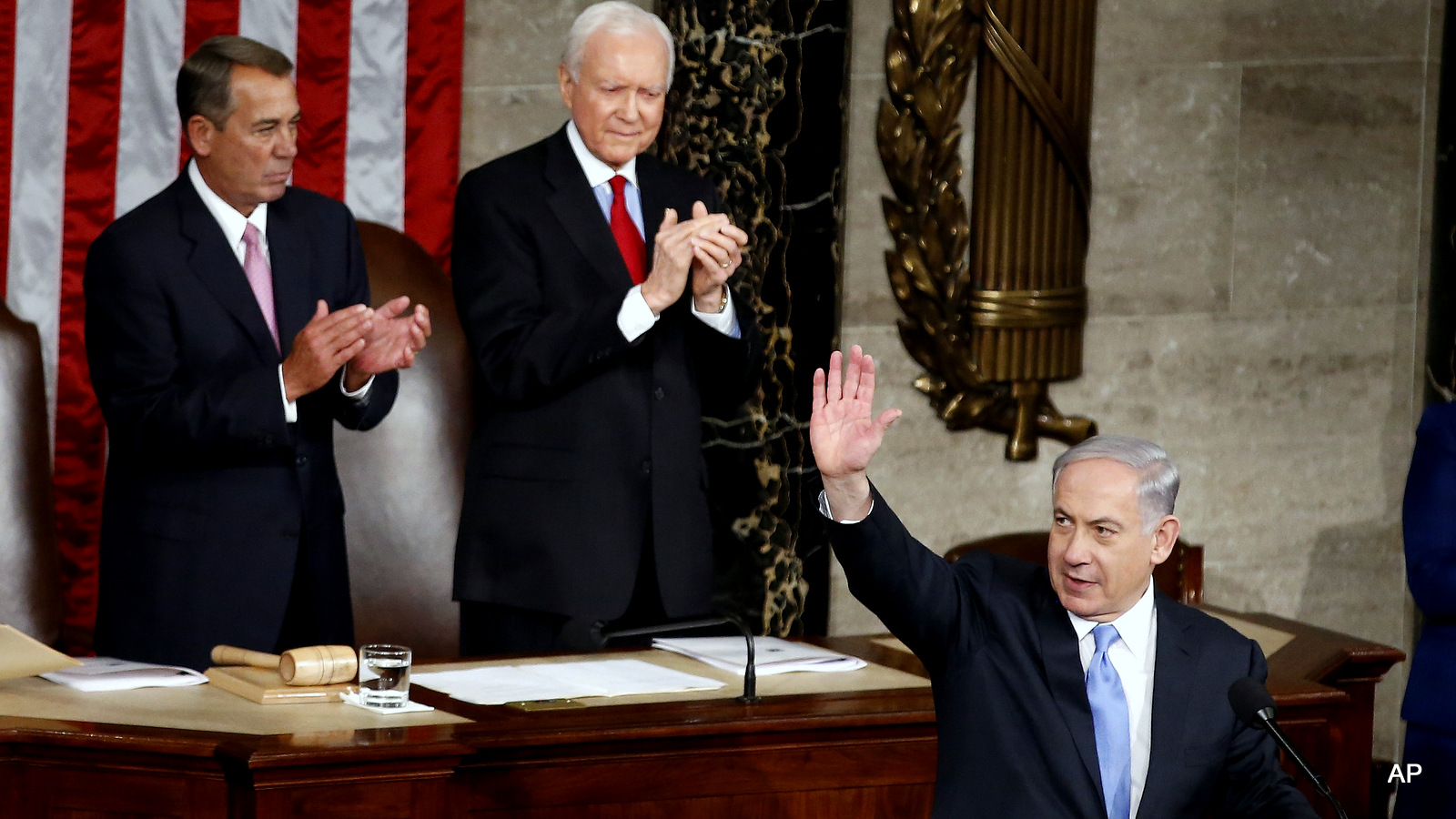 Israeli Prime Minister Benjamin Netanyahu waves as he step to the podium prior to speaking before a joint meeting of Congress on Capitol Hill in Washington, Tuesday, March 3, 2015. Prime Minister Netanyahu is used the address to warn against trusting Iran to curb its nuclear ambitions.