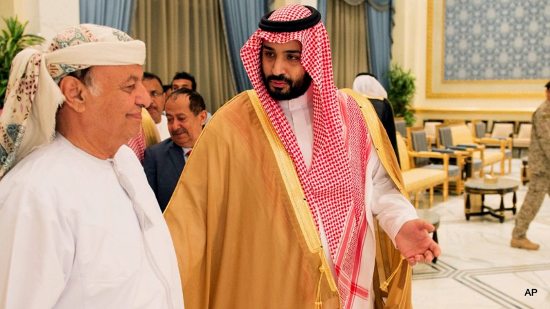 Yemen's President Abed Rabbo Mansour Hadi, left, walks with Saudi Defense Minister Mohammed bin Salman as he arrives in Riyadh, Saudi Arabia, Thursday, March 26, 2015.