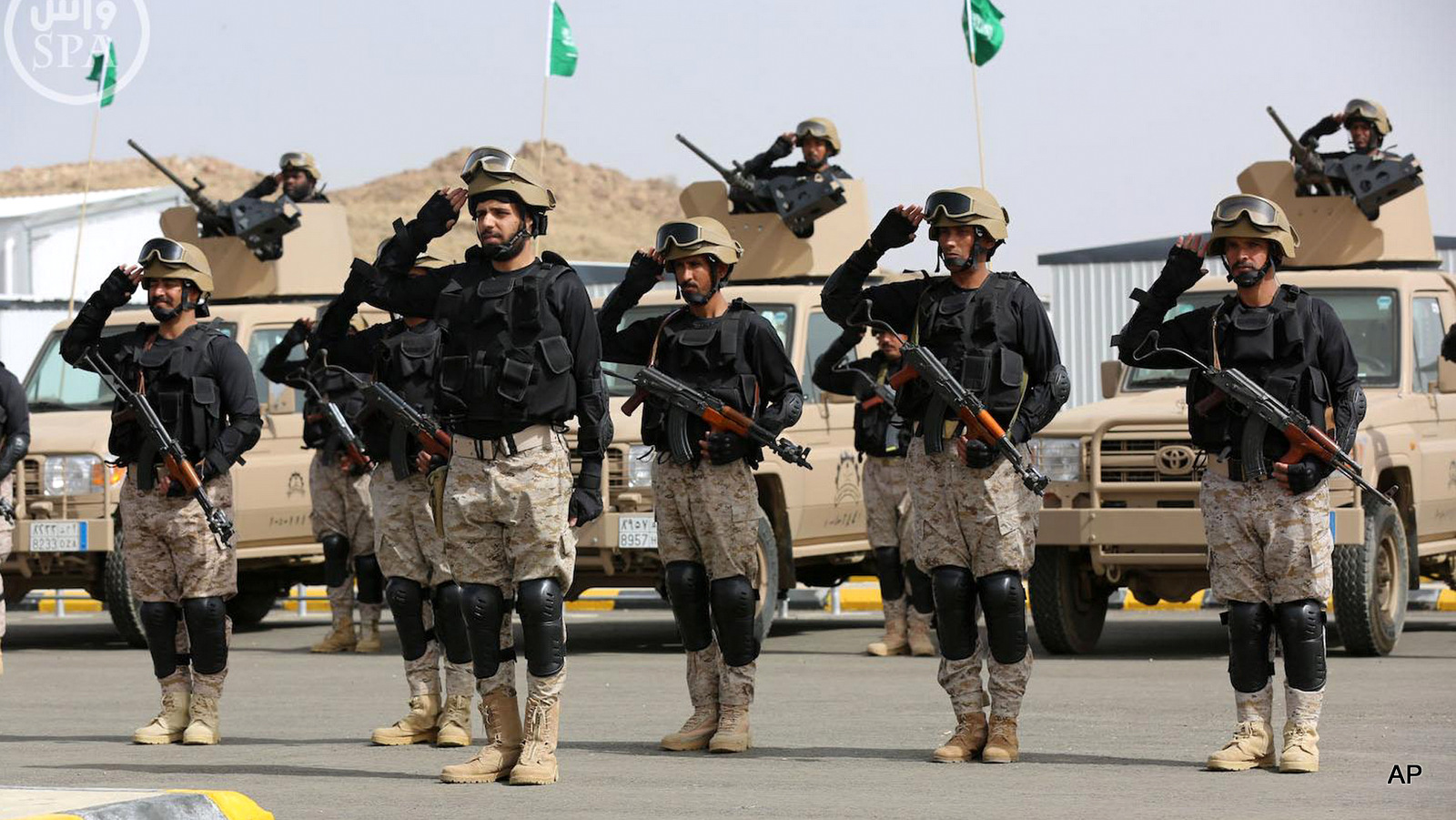 In this photo provided by the Saudi Press Agency (SPA), Royal Saudi Land Forces and units of Special Forces of the Pakistani army take part in a joint military exercise called "Al-Samsam 5" in Shamrakh field, north of Baha region, southwest Saudi Arabia, Monday, March 30, 2015. 