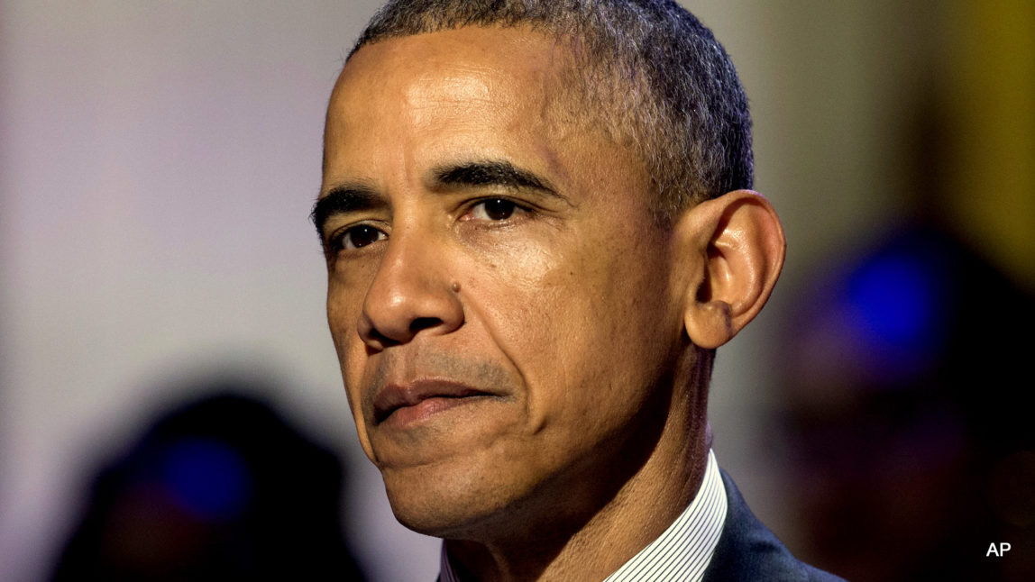 President Barack Obama pauses as he speaks in the East Room of the White House, in Washington, Tuesday, April 14, 2015.