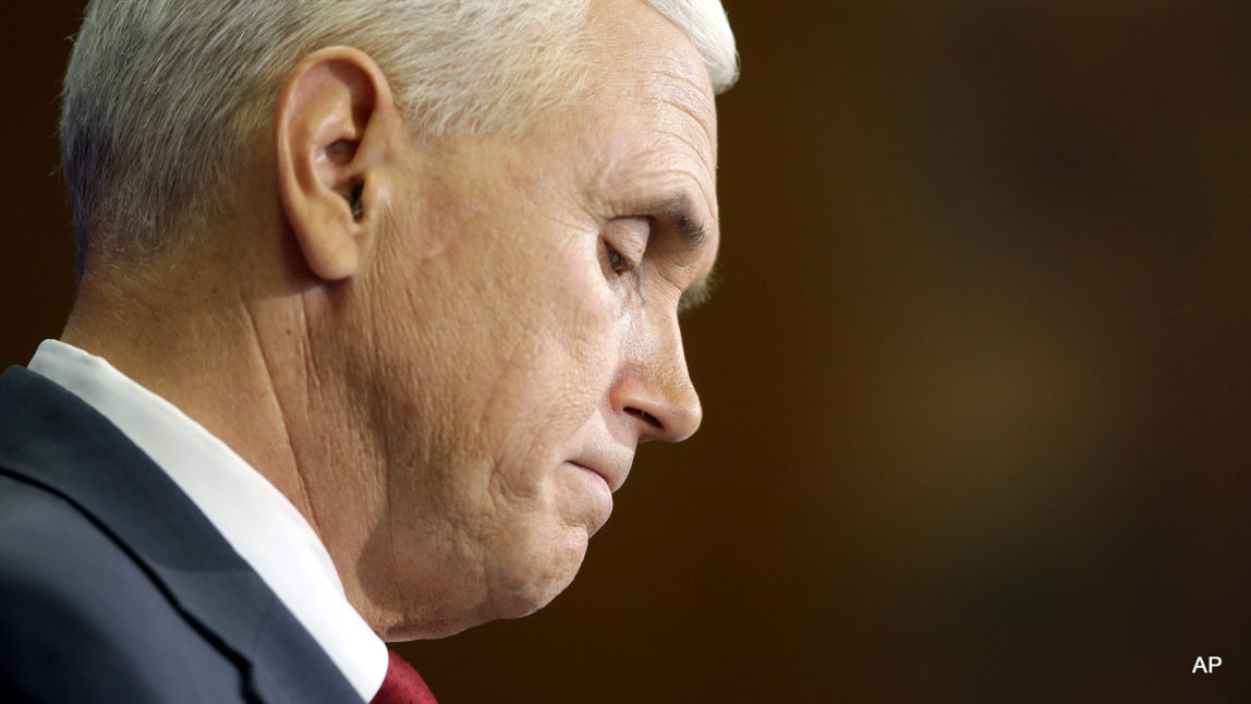 Indiana Gov. Mike Pence listens to a question during a news conference, Tuesday, March 31, 2015, in Indianapolis. Pence said that he wants legislation on his desk by the end of the week to clarify that the state's new religious-freedom law does not allow discrimination against gays and lesbians.