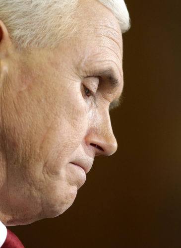 Indiana Gov. Mike Pence listens to a question during a news conference, Tuesday, March 31, 2015, in Indianapolis. Pence said that he wants legislation on his desk by the end of the week to clarify that the state's new religious-freedom law does not allow discrimination against gays and lesbians.
