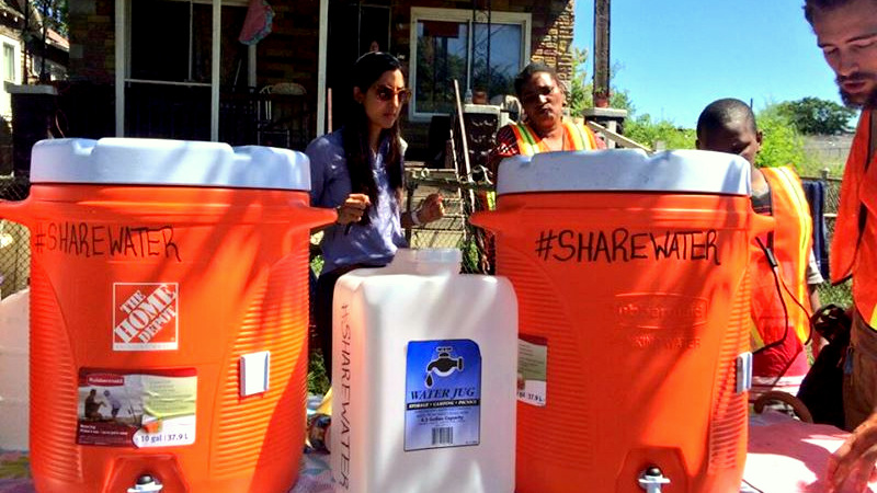 Detroit Water Brigade distribute in a Detroit neighborhood. 