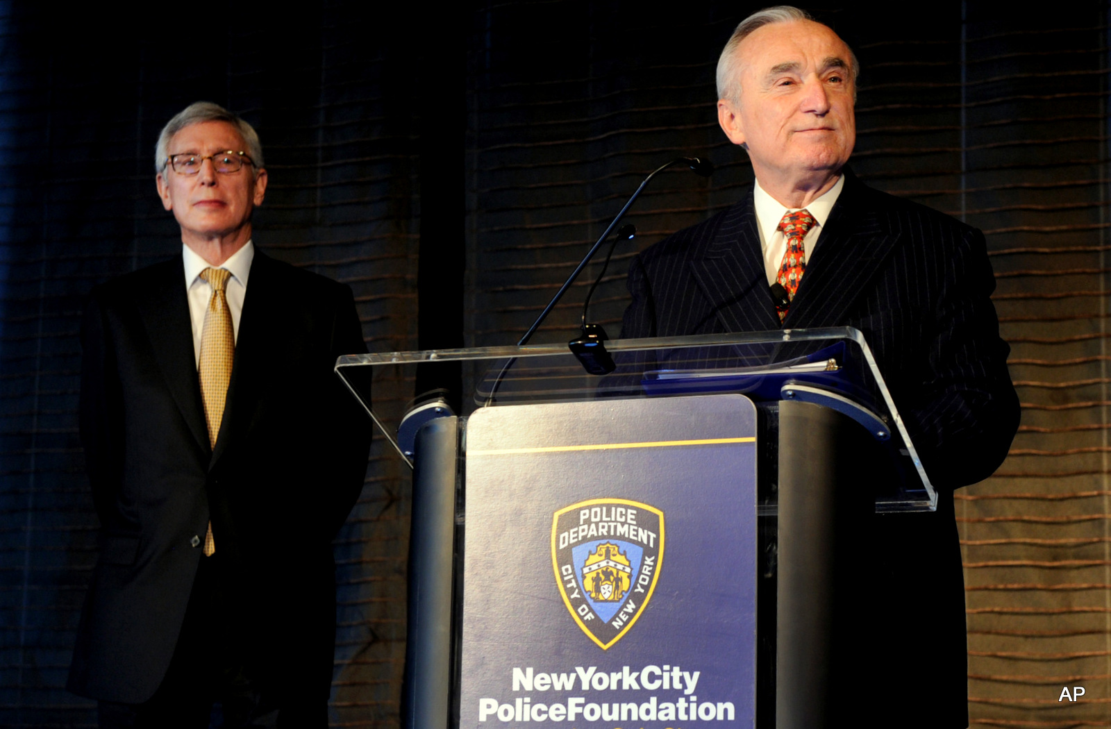 New York City Police Commissioner William J. Bratton, right, joined by H. Dale Hemmerdinger, Chairman of the Board, New York City Police Foundation, speaks at the Foundation's State of the NYPD breakfast in New York, Thursday, Jan. 29, 2015.
