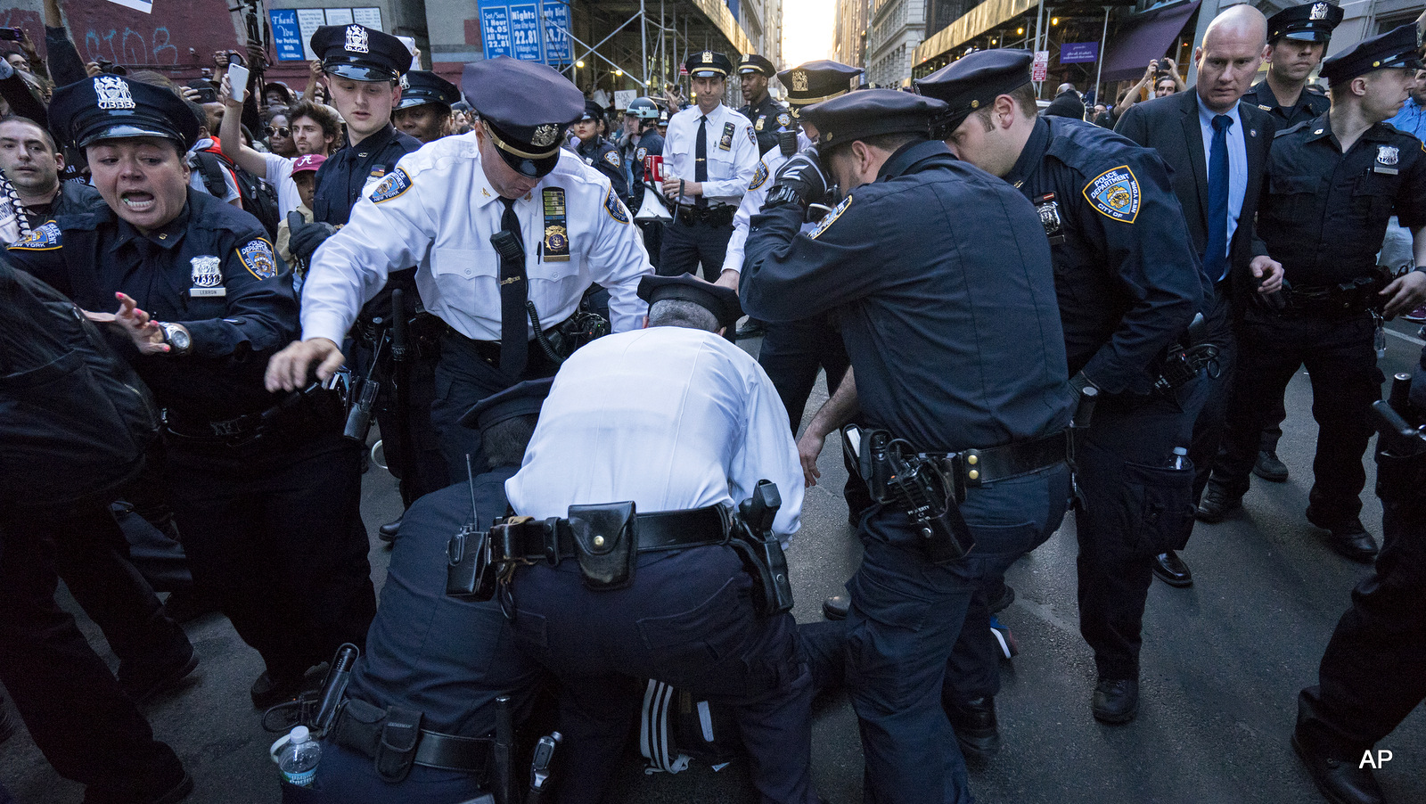 Protesters engage with police officers near Union Square, Wednesday, April 29, 2015, in New York. People gathered to protest the death of Freddie Gray, a Baltimore man who was critically injured in police custody. 