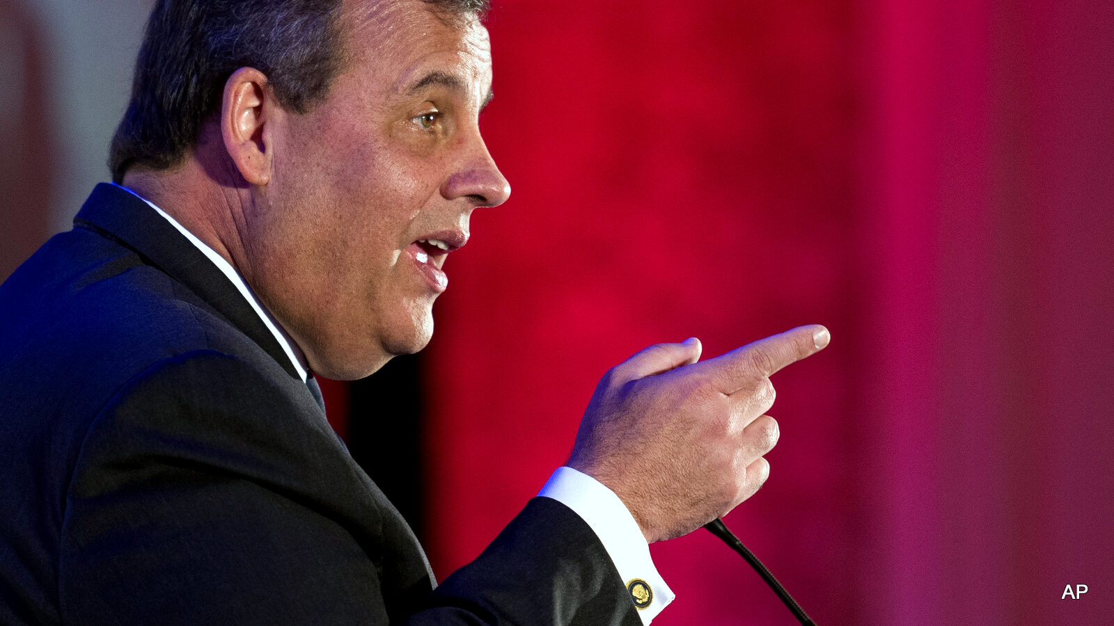 N.J. Gov. Chris Christie gestures while speaking at the Northern Virginia Technology Council (NVTC) in Tyson's Corner, Va., Friday, May 1, 2015. (AP Photo/Cliff Owen)