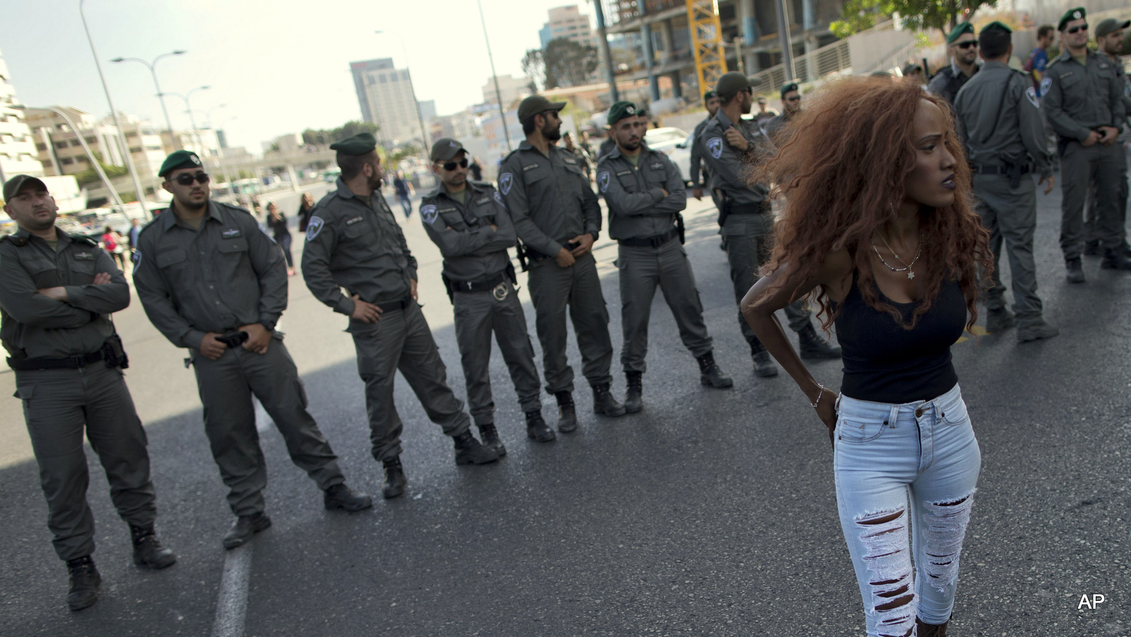 Israel's Jewish Ethiopians block highway during a protest against racism and police brutality in Tel Aviv, Israel, Sunday, May 3, 2015. Several thousand people, mostly from Israel's Jewish Ethiopian minority, protested in Tel Aviv against racism and police brutality on Sunday shutting down a major highway and scuffling with police. 