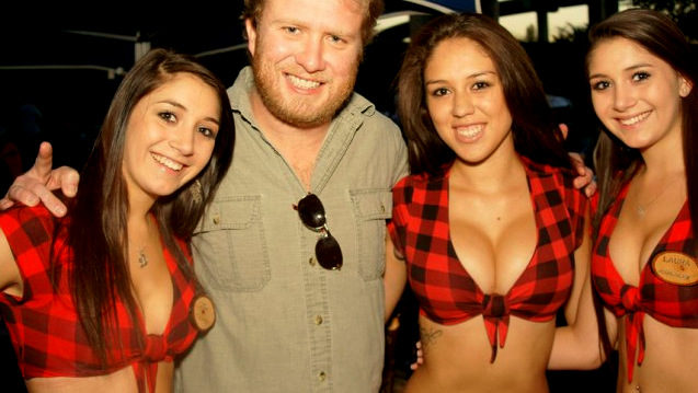 Waitresses and a customer at a Texas-area Twin Peaks restaurant CREDIT: Flickr Creative Commons via MarkScottAustinTX