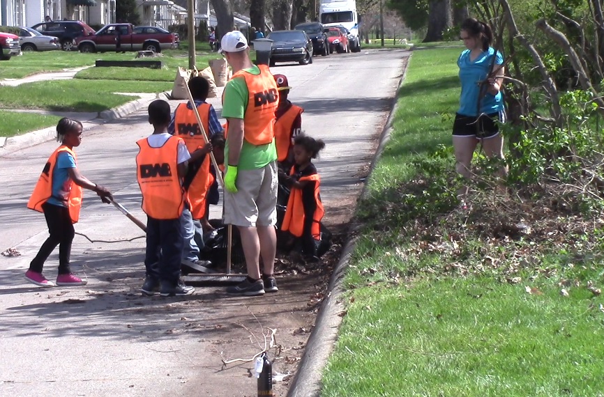 Volunteers with the Detroit Water Brigade cleaning up the streets of Detroit.