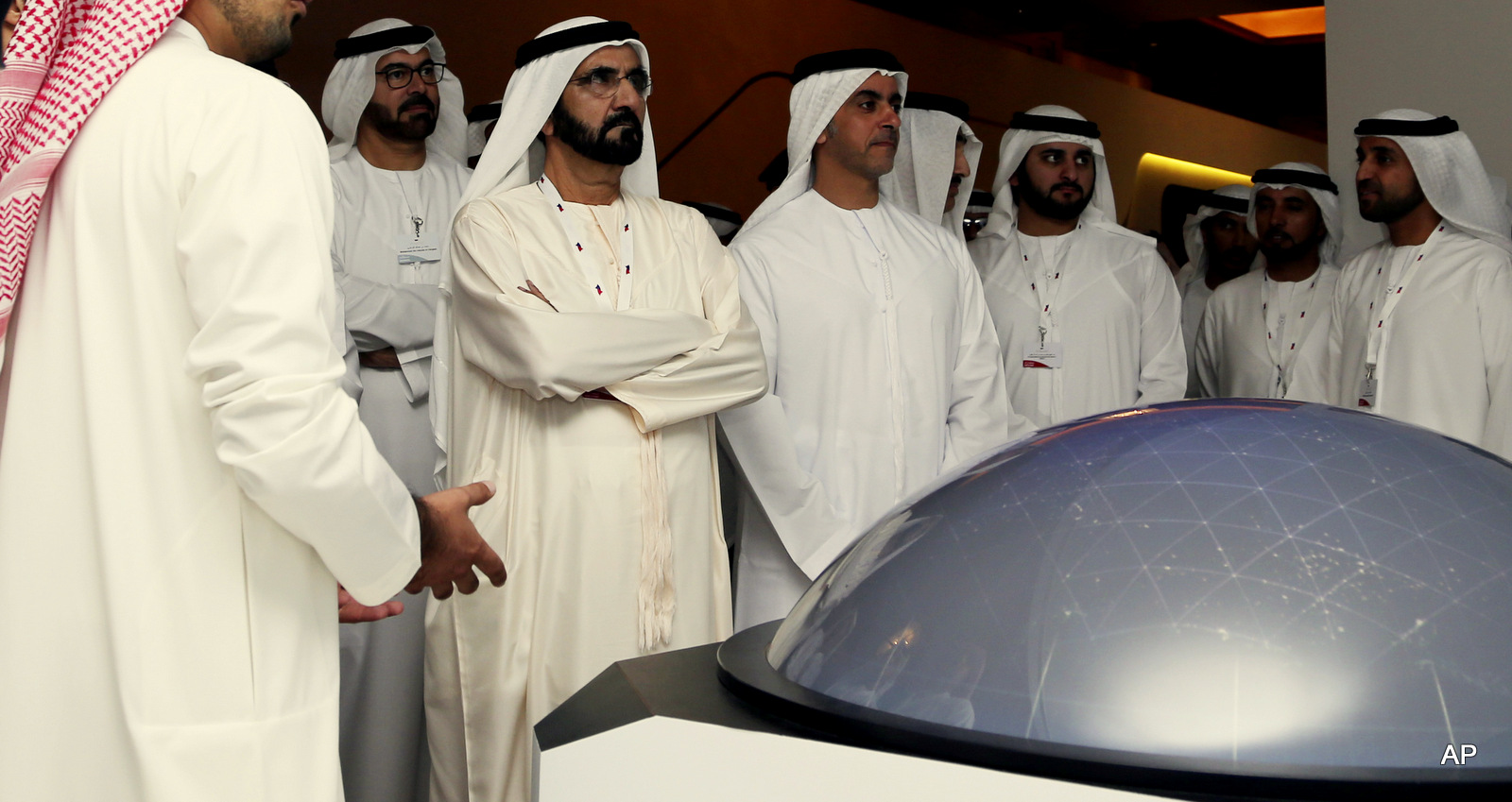 Sheikh Mohammed Bin Rashid Al Maktoum, UAE prime minister and ruler of Dubai, 3rd left, listens to a presenter at the Arab Strategy Forum in Dubai