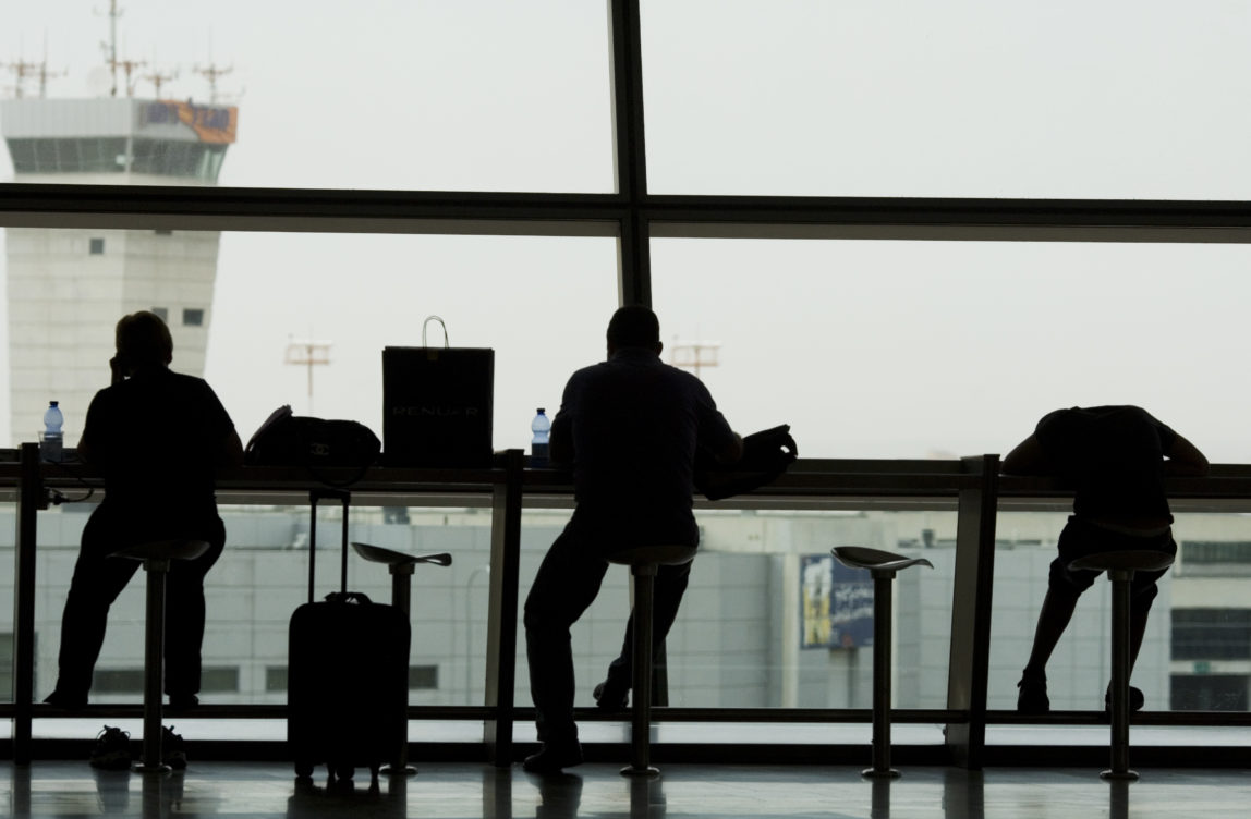 Stranded passengers wait in Ben Gurion airport near Tel Aviv, Israel. (AP Photo)