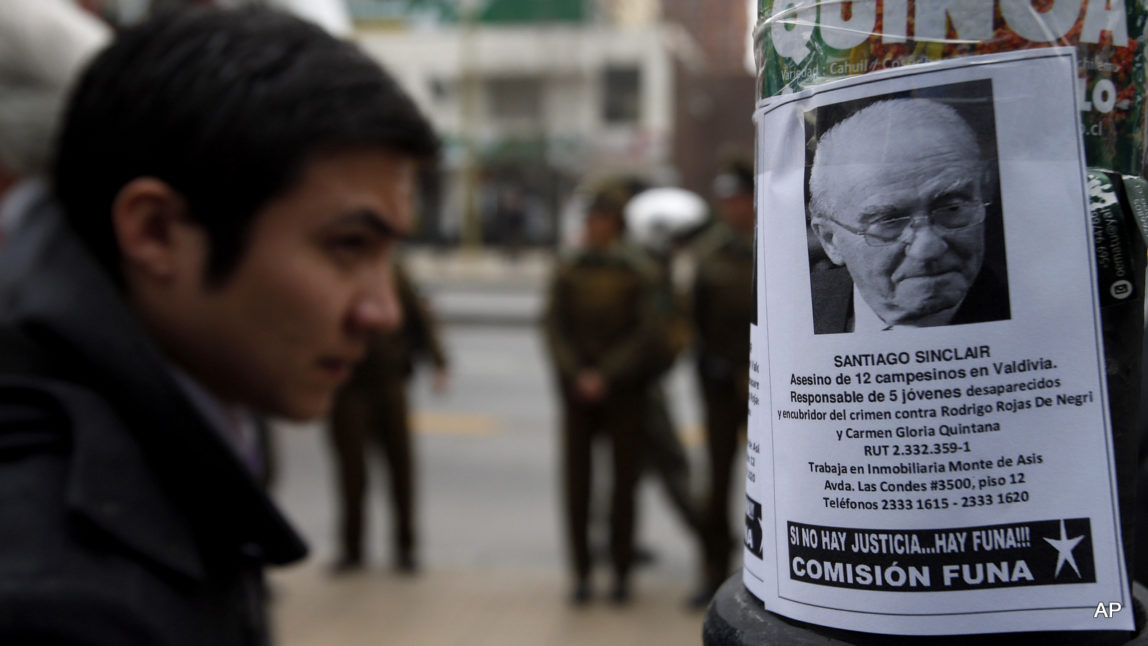 A man reads a leaflet