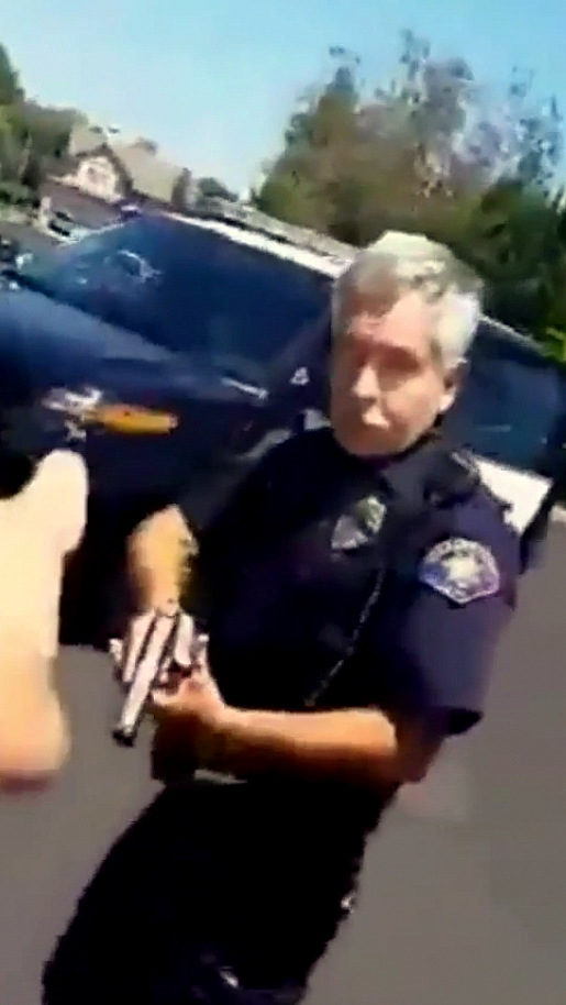 Video: Officer Pulls Gun On Man For Recording Him From His Driveway