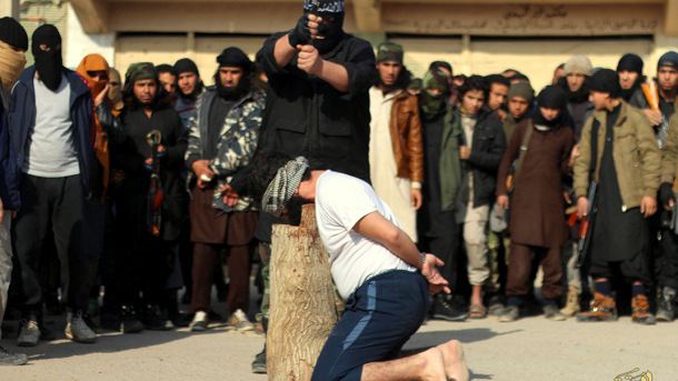 ISIS serving their own violent brand of justice in the captured Syrian city of Al-Raqqah.