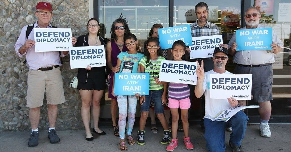 Demonstrators call on Rep. Ed Perlmutter (D-CO) to support the Iran deal at a town hall meeting in Denver, Colorado August 4, 2015. (Photo courtesy of MoveOn)