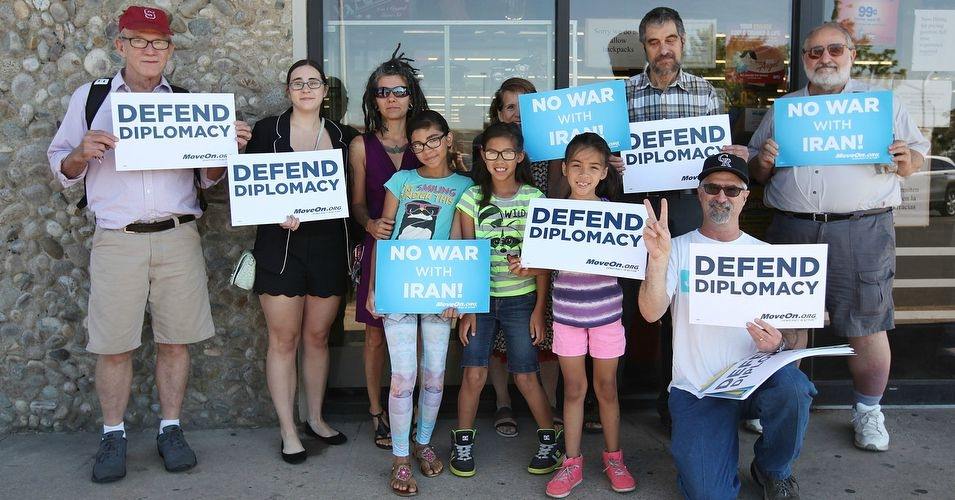 Demonstrators call on Rep. Ed Perlmutter (D-CO) to support the Iran deal at a town hall meeting in Denver, Colorado August 4, 2015. (Photo courtesy of MoveOn)