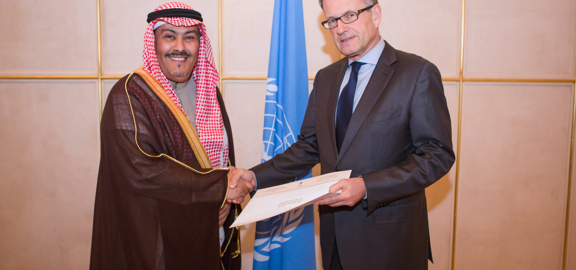 Faisal bin Hassan Trad, the Kingdom of Saudi Arabia (left), presents his credentials to the Acting Director-General of the United Nations Office, Michael Møller( right) at Geneva. January 7th, 2014. Photo by Pierre Albouy