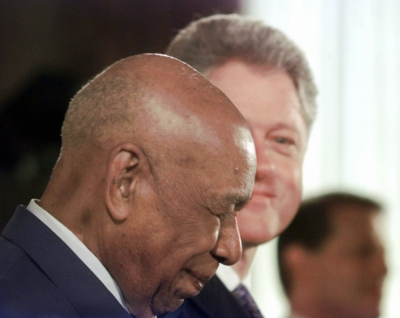 Herman Shaw, 94, a Tuskegee Syphilis Study victim, smiles after receiving an official apology from President Clinton Friday, May 16, 1997, in Washington. Making amends for a shameful U.S. experiment, Clinton apologized to black men whose syphilis went untreated by government doctors. (AP Photo/Greg Gibson)