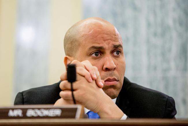 FILE - In this June 10, 2015 file photo, Sen. Cory Booker, D-N.J., attends a Senate Commerce, Science and Transportation hearing on Capitol Hill in Washington. Booker announced his support for the Iran nuclear deal on Thursday, siding with President Barack Obama and bucking home-state pressures to say “no.” (AP Photo/Andrew Harnik)
