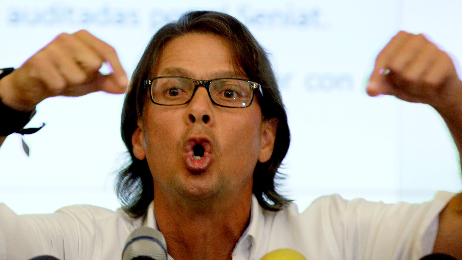 Empresas Polar chief executive Lorenzo Mendoza gives a news conference at his office in Caracas, Venezuela, Monday, May 13, 2013. Mendoza said Monday that, in his words, "the accusations that we are producing less than last year are false," rejecting President Nicolas Maduro's claims that it's to blame for the country's persistent food shortages. Mendoza offered to buy or rent government-owned corn processing plants to increase Venezuela's production, and food makers say shortages of basic foods like sugar, milk, butter and cornmeal stem from the socialist government's price controls and a lack of foreign currency to pay for imports. (AP Photo/Fernando Llano)