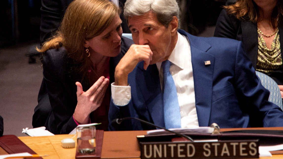 United States Secretary of State John Kerry speaks with United States Ambassador Samantha Power during the United Nations Security Council at the United Nations headquarters Wednesday, Sept. 30, 2015. During the meeting, Kerry delivered remarks encouraging the international community to end the conflict in Syria. (AP Photo/Kevin Hagen)