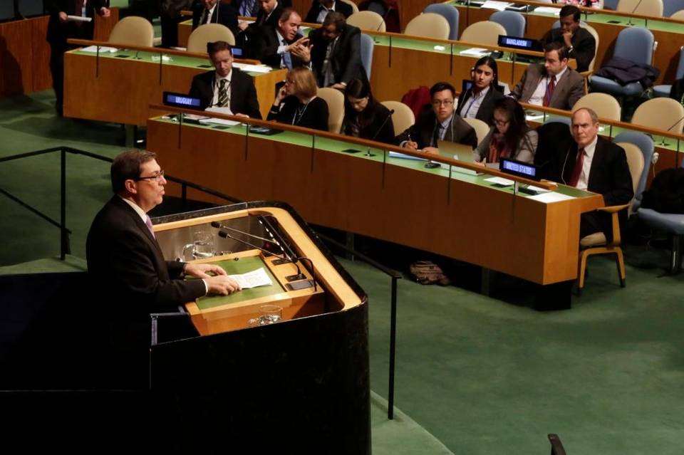Cuba's Foreign Minister Bruno Rodriguez addresses the U.N. General Assembly, Tuesday, Oct. 27, 2015, as U.S. Ambassador Ronald Godard listens, at right. Richard Drew AP