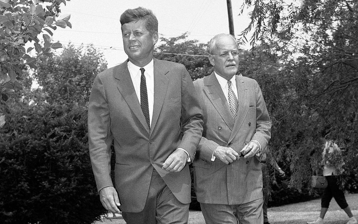 Sen. John F. Kennedy, (left), and Allen W. Dulles, Central Intelligence Agency (CIA) director, walks towards newsmen on the lawn of the Democratic presidential candidates in Hyannis Port, MA., home on July 23, 1960. AP
