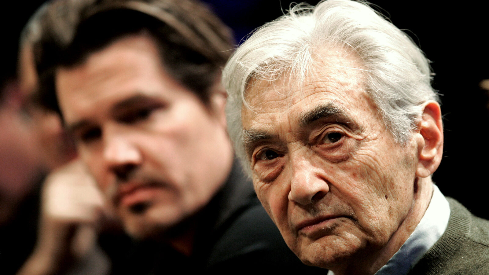 Author Howard Zinn, right, and actor Josh Brolin, left, take part in a panel discussion about the mini-series entitled "The People Speak", Wednesday, Jan. 9, 2008, at Emerson College in Boston. (AP Photo/Michael Dwyer)