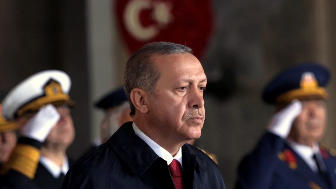 Turkish President Recep Tayyip Erdogan stands at the mausoleum of Turkey's founder Mustafa Kemal Ataturk on Republic Day in Ankara, Turkey, Thursday, Oct. 29, 2015. (AP Photo/Burhan Ozbilici)