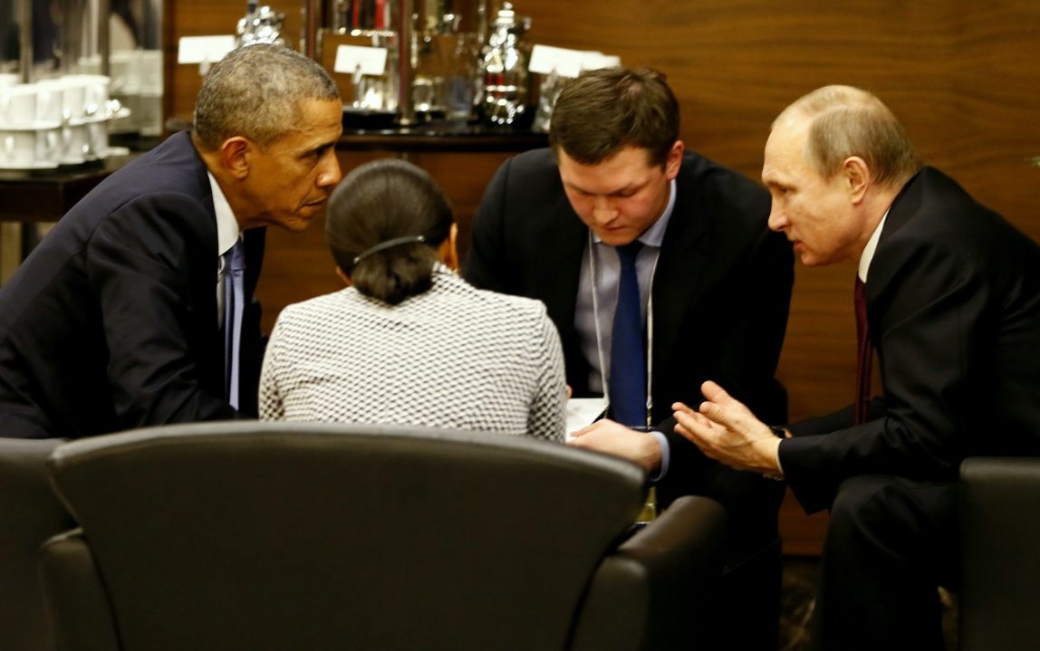 U.S. President Barack Obama, left, speaks with Russian President Vladimir Putin, right prior to the opening session of the G-20 summit in Antalya, Turkey, Sunday, Nov. 15 2015. The 2015 G-20 Leaders Summit is held near the Turkish Mediterranean coastal city of Antalya on Nov. 15-16, 2015. (Cem Oksuz/Anadolu)