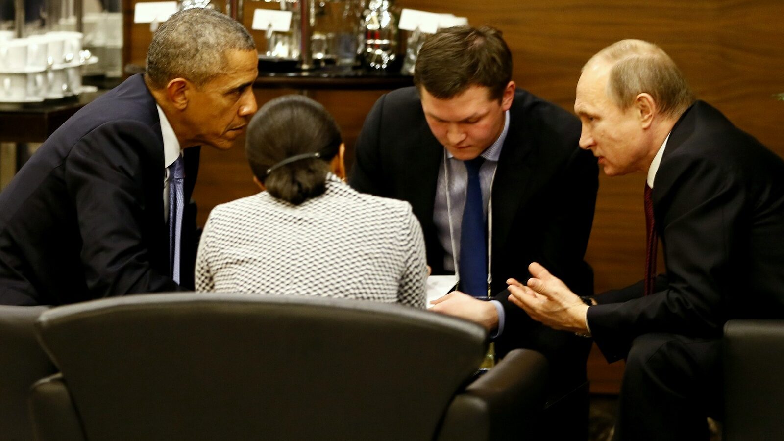 U.S. President Barack Obama, left, speaks with Russian President Vladimir Putin, right prior to the opening session of the G-20 summit in Antalya, Turkey, Sunday, Nov. 15 2015. The 2015 G-20 Leaders Summit is held near the Turkish Mediterranean coastal city of Antalya on Nov. 15-16, 2015. (Cem Oksuz/Anadolu)