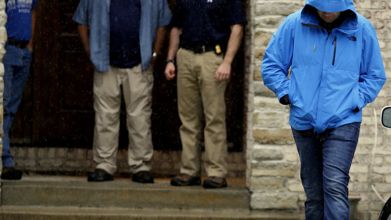 Subway restaurant spokesman Jared Fogle walks to a waiting car as he leaves his home, in Zionsville, Ind. A raid at Fogle's home on Tuesday is just the latest bad news to hit the ubiquitous sandwich chain. The company has been struggling with sales, its CEO is being treated for cancer and it’s trying to convince customers about the quality and value of its food. (AP Photo/Michael Conroy)