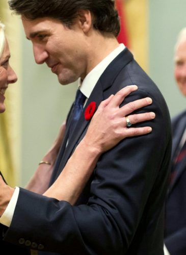 Prime Minister Justin Trudeau hugs Environment and Climate Change Minister Catherine McKenna at Rideau Hall in Ottawa on Wednesday, Nov. 4, 2015. (Sean Kilpatrick/The Canadian Press via AP)