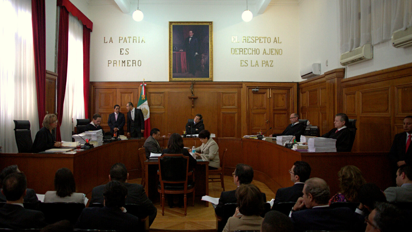 Supreme Court Justices discuss a challenge to the constitutionality of a ban on recreational marijuana use in Mexico City, Wednesday, Nov. 4, 2015. Mexico's court ruled Wednesday that growing, possessing and smoking marijuana for recreation are legal under a person's right to personal freedoms. (AP Photo/Eduardo Verdugo)