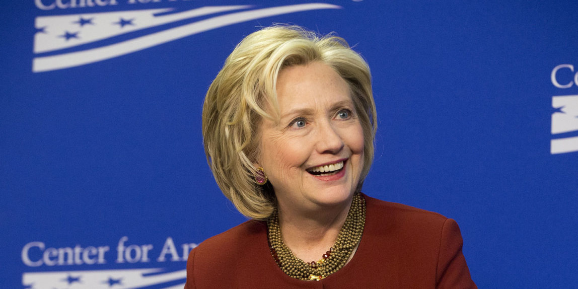 Former Secretary of State Hillary Rodham Clinton, gets up from her seat after speaking at an event hosted by the Center for American Progress (CAP) and the America Federation of State, County and Municipal Employees (AFSCME), in Washington, Monday, March 23, 2015. (AP Photo/Pablo Martinez Monsivais)